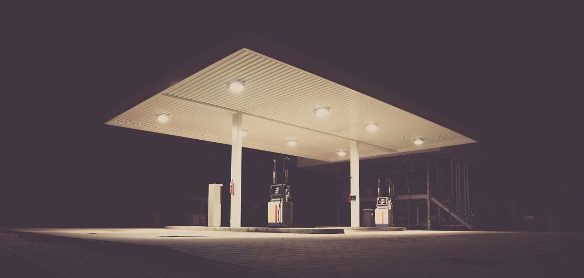 pump gasoline station during night time gas pump
